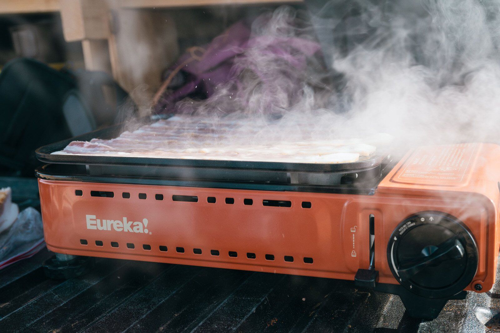 Bacon steaming on the Eureka SPRK camping stove