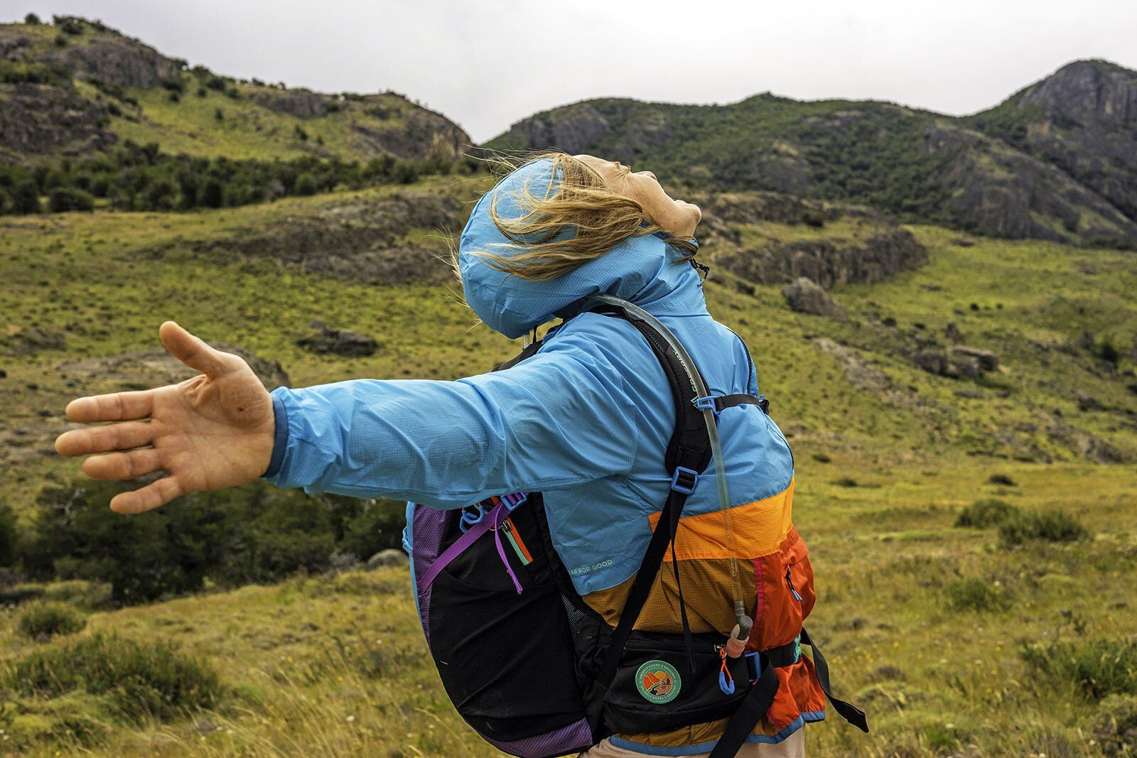 Braving wind carrying Gregory Maya 20 daypack