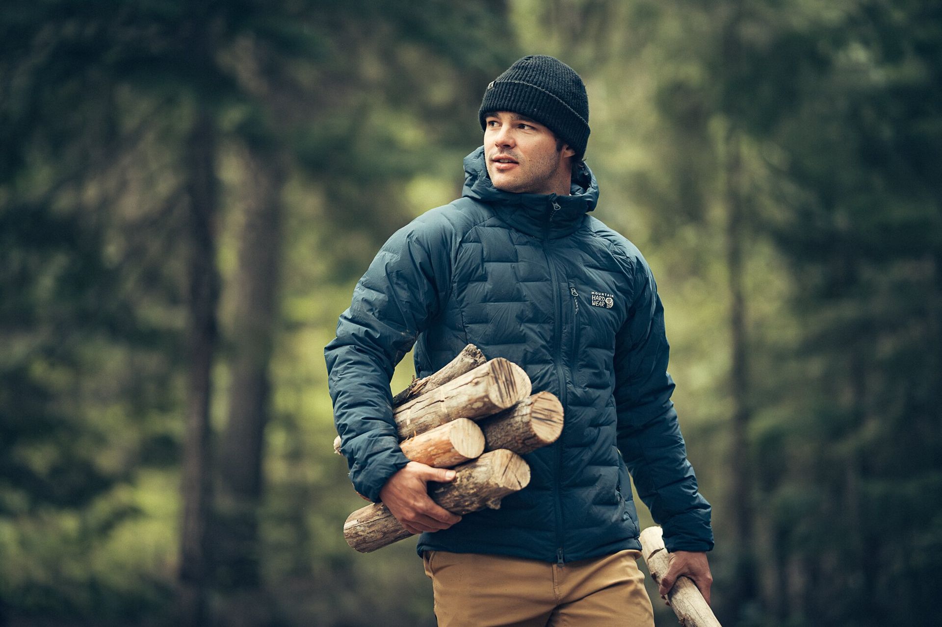Carrying wood in Mountain Hardwear StretchDown Hoody down jacket