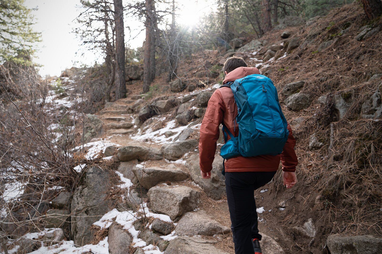 Climbing rocky trail with Gregory Zulu LT 24 daypack