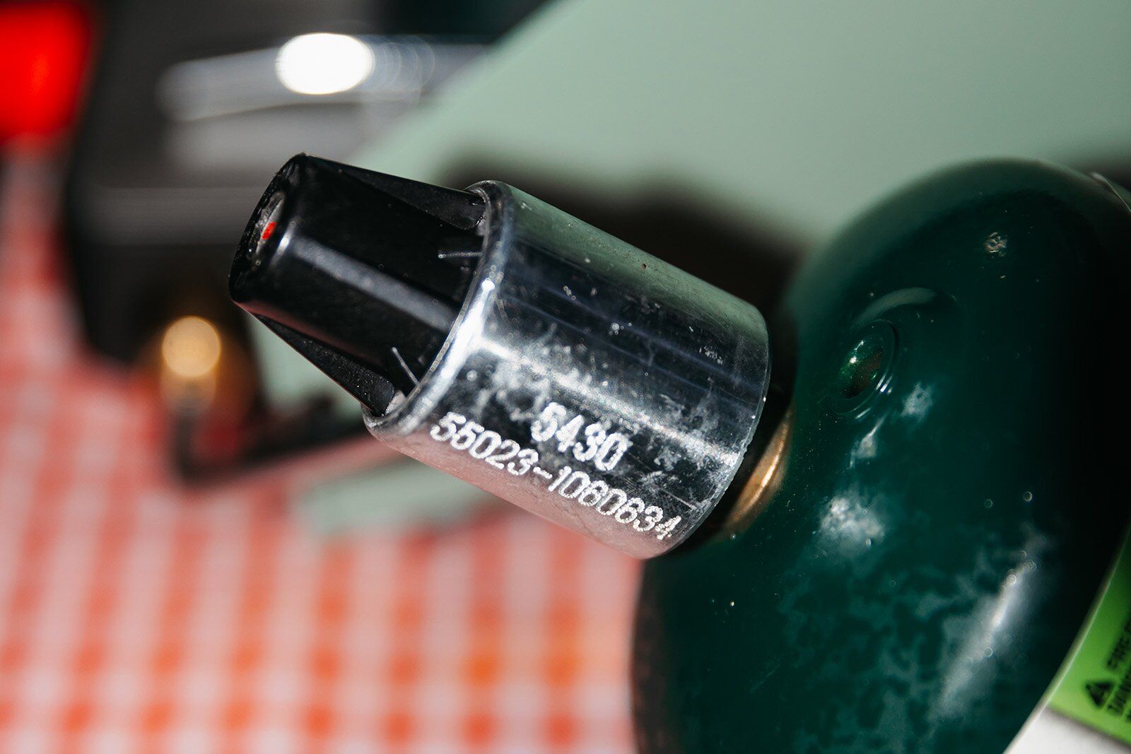 Close-up of Coleman Cascade Classic camping stove fuel canister