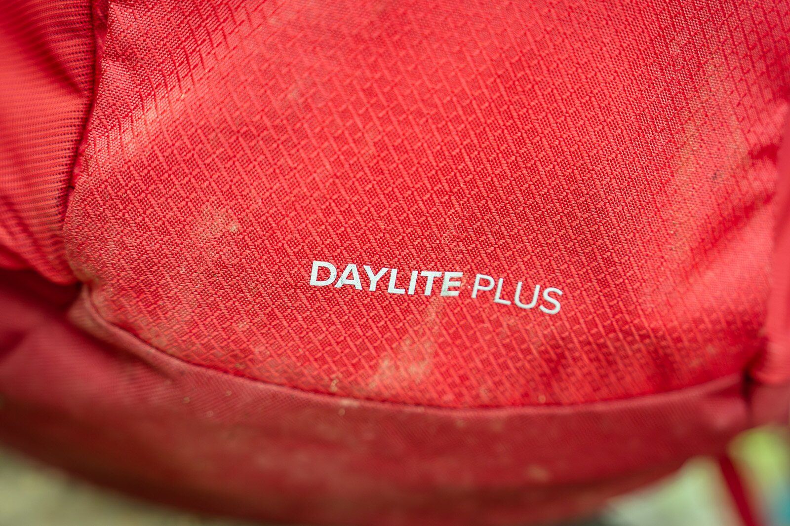 Close-up of product name on Osprey Daylite Plus hiking daypack
