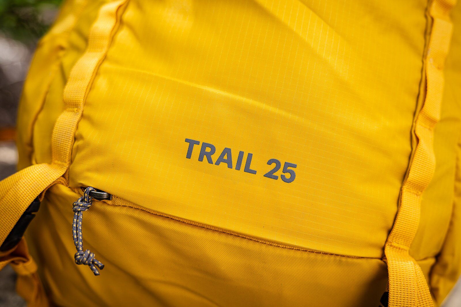 Close-up of product name on the REI Co-op Trail 25 hiking daypack