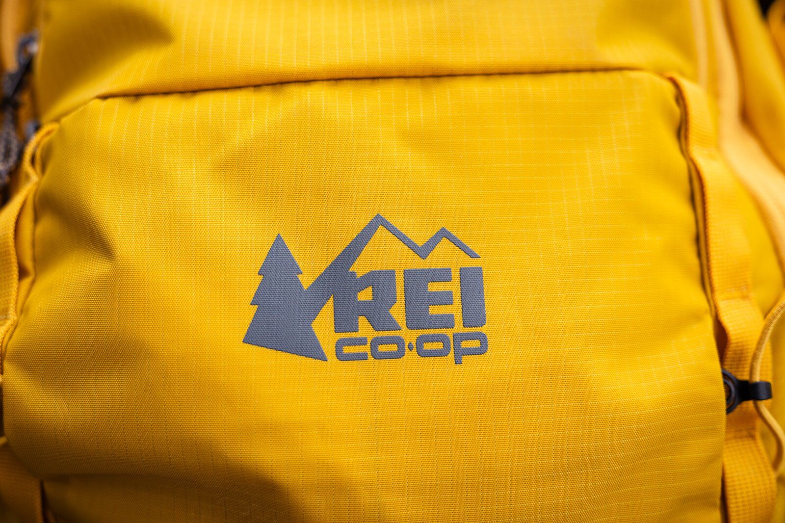 Close-up of REI logo on the REI Co-op Trail 25 hiking daypack