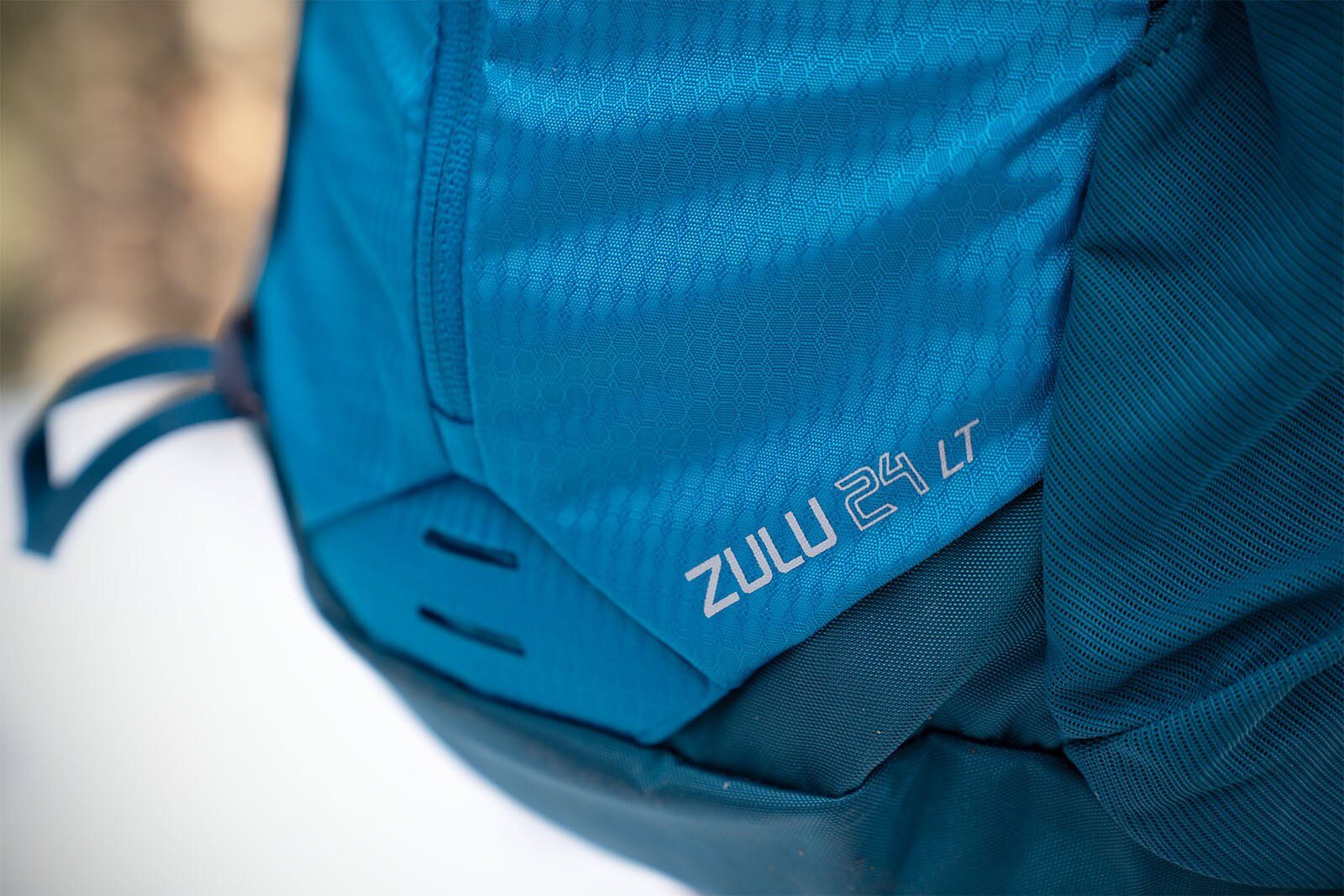 Closeup of Gregory Zulu 24 LT hiking daypack logo