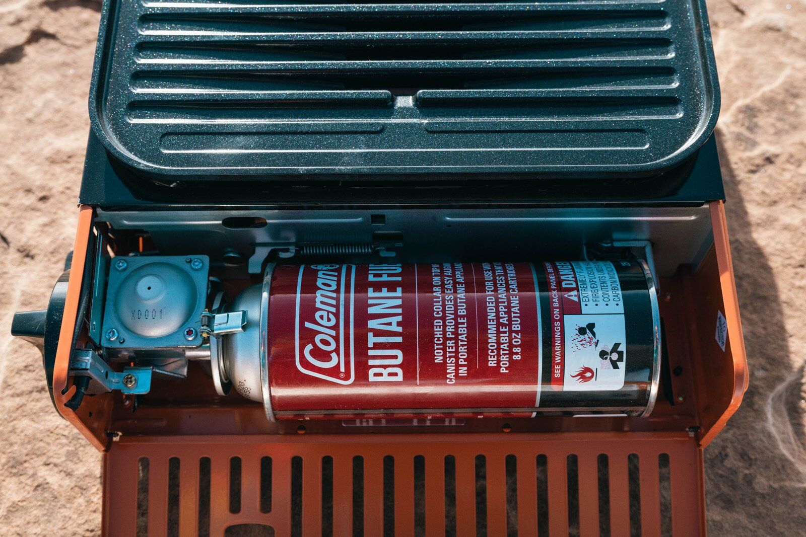 Eureka SPRK camping stove with fuel canister attached