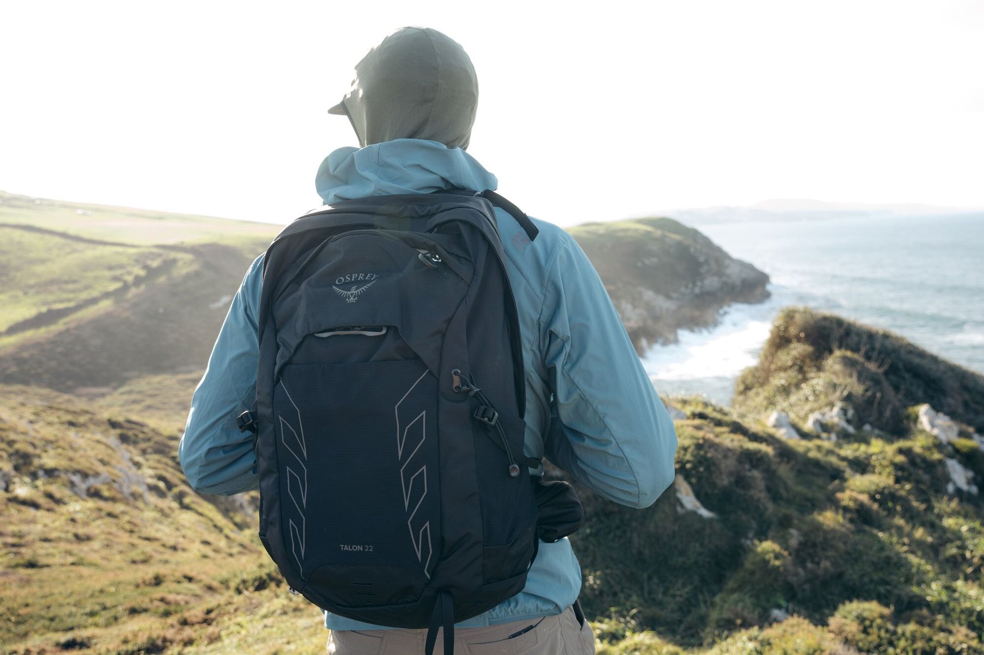 Front view of Osprey Talon 22 hiking daypack on hiker