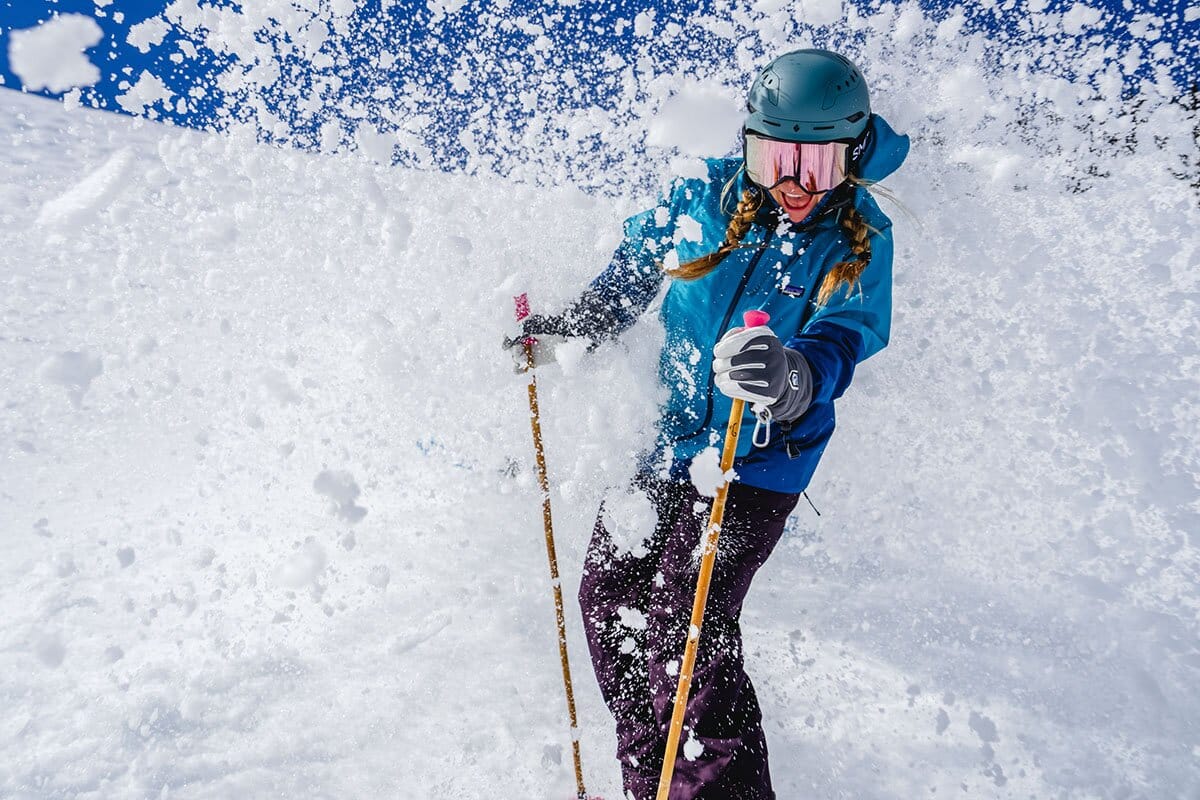 Getting blasted by snow in Patagonia Storm Shift Ski Jacket mobile
