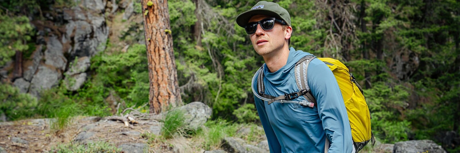 Hiker wearing the REI Co-op Flash 22 hiking daypack