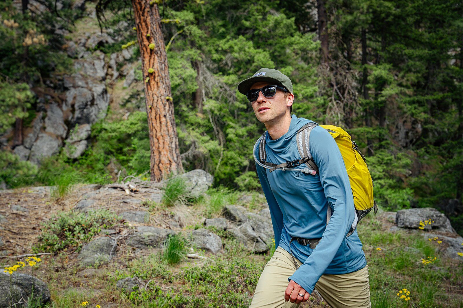 Hiker wearing the REI Co-op Flash 22 hiking daypack