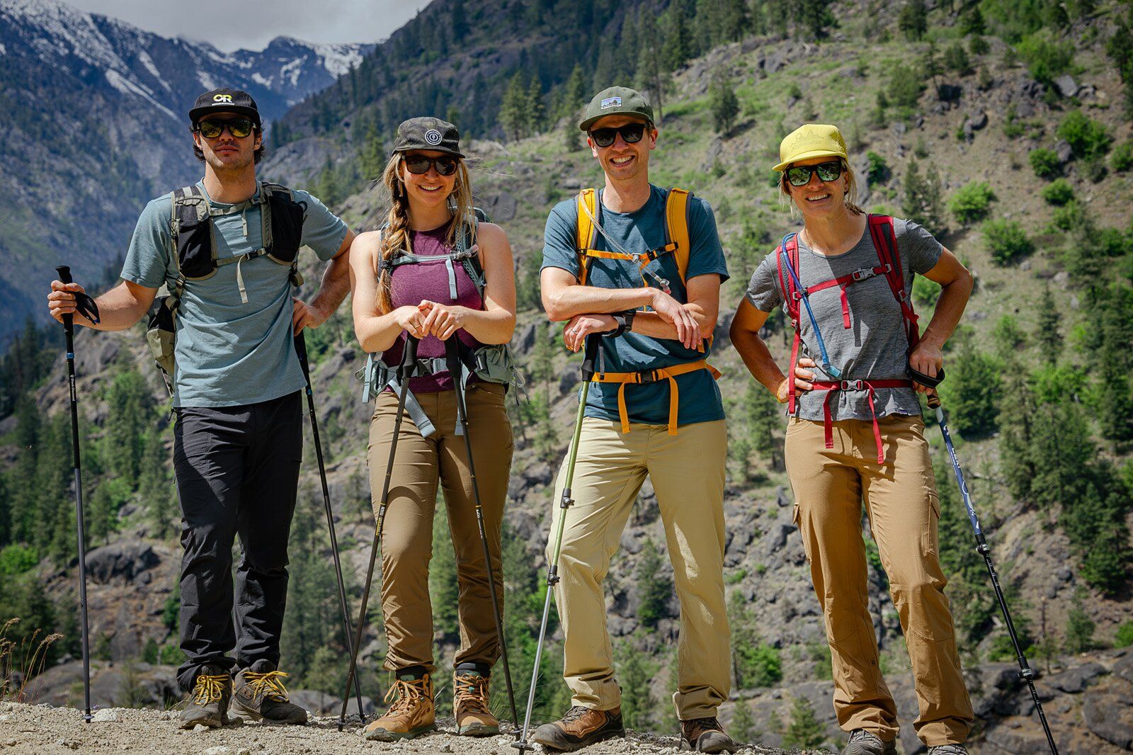 Hiker with friends wearing the Mystery Ranch Gallagator 25 hiking daypack