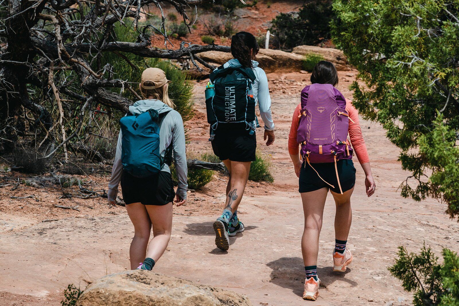 Hiking across desert rock with Black Diamond Distance 15 hiking daypack