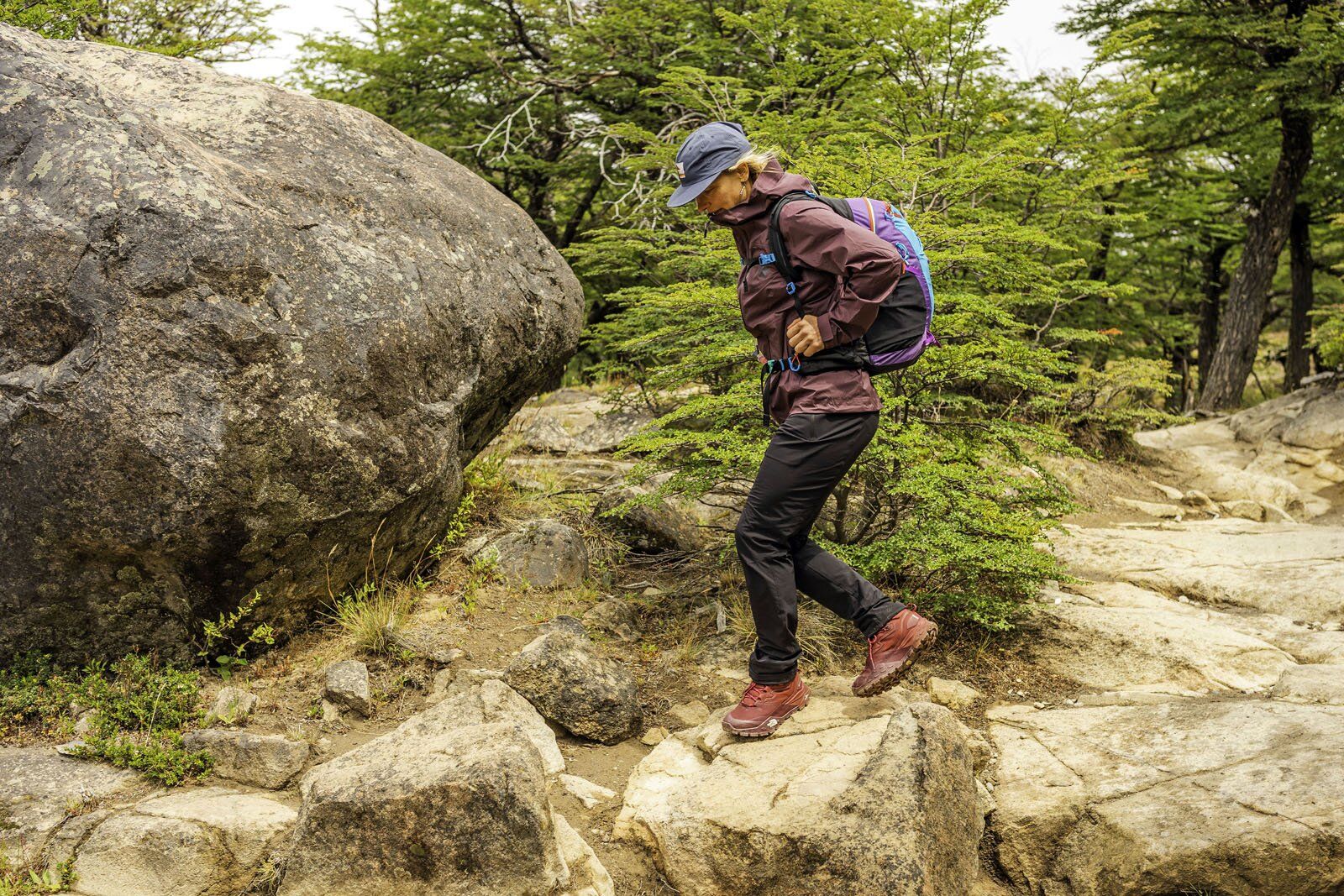 Hiking on rocks carrying Gregory Maya 20 daypack