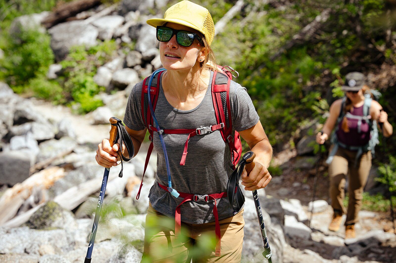 Hiking up trail with Osprey Daylite Plus hiking daypack