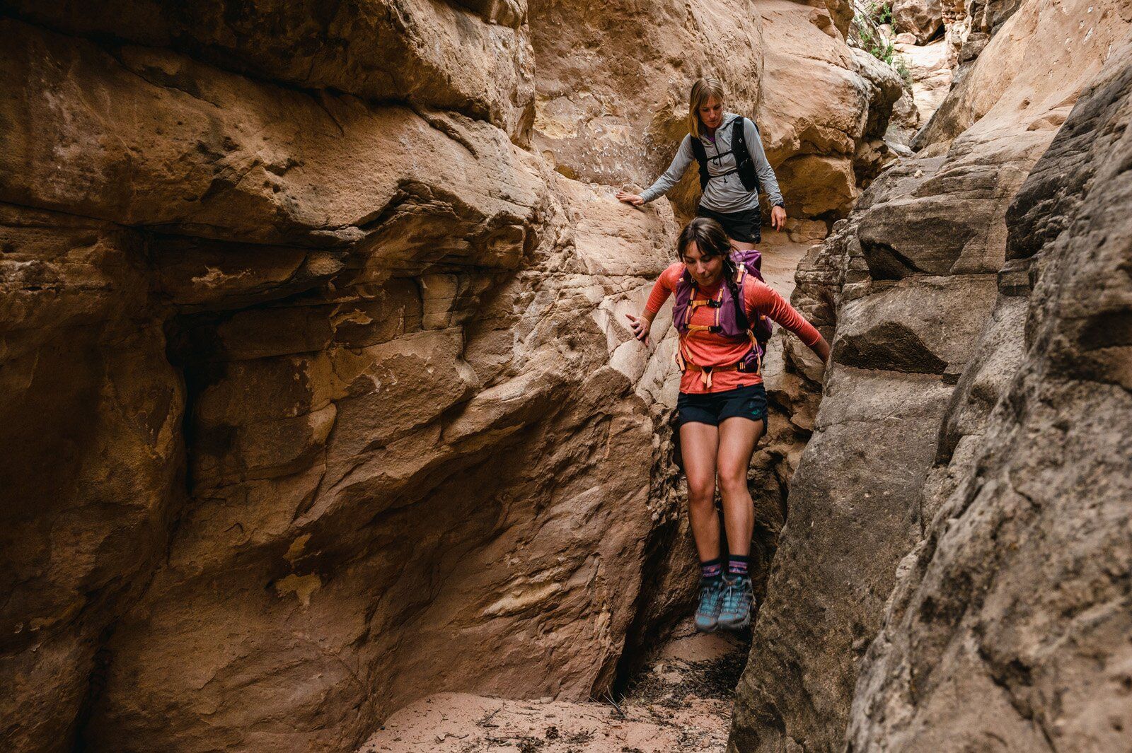 Moving through narrow canyon with Osprey Tempest Velocity 30 hiking daypack