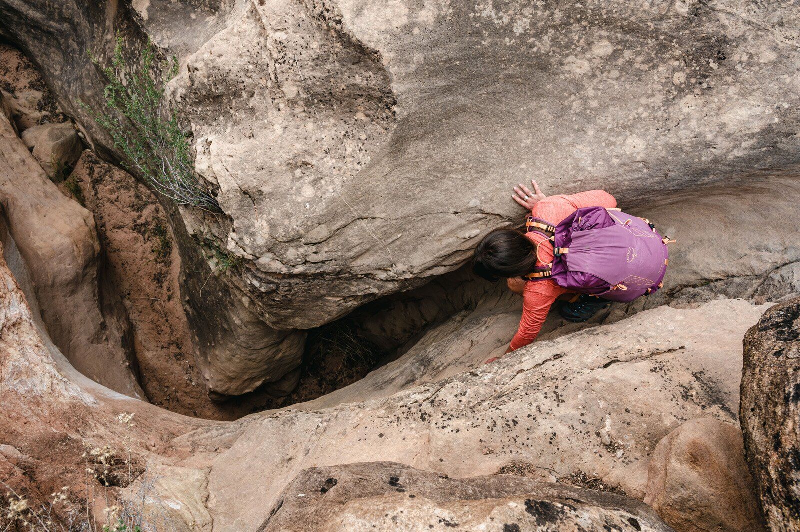 Passing through narrow canyon section with Osprey Tempest Velocity 30 hiking daypack