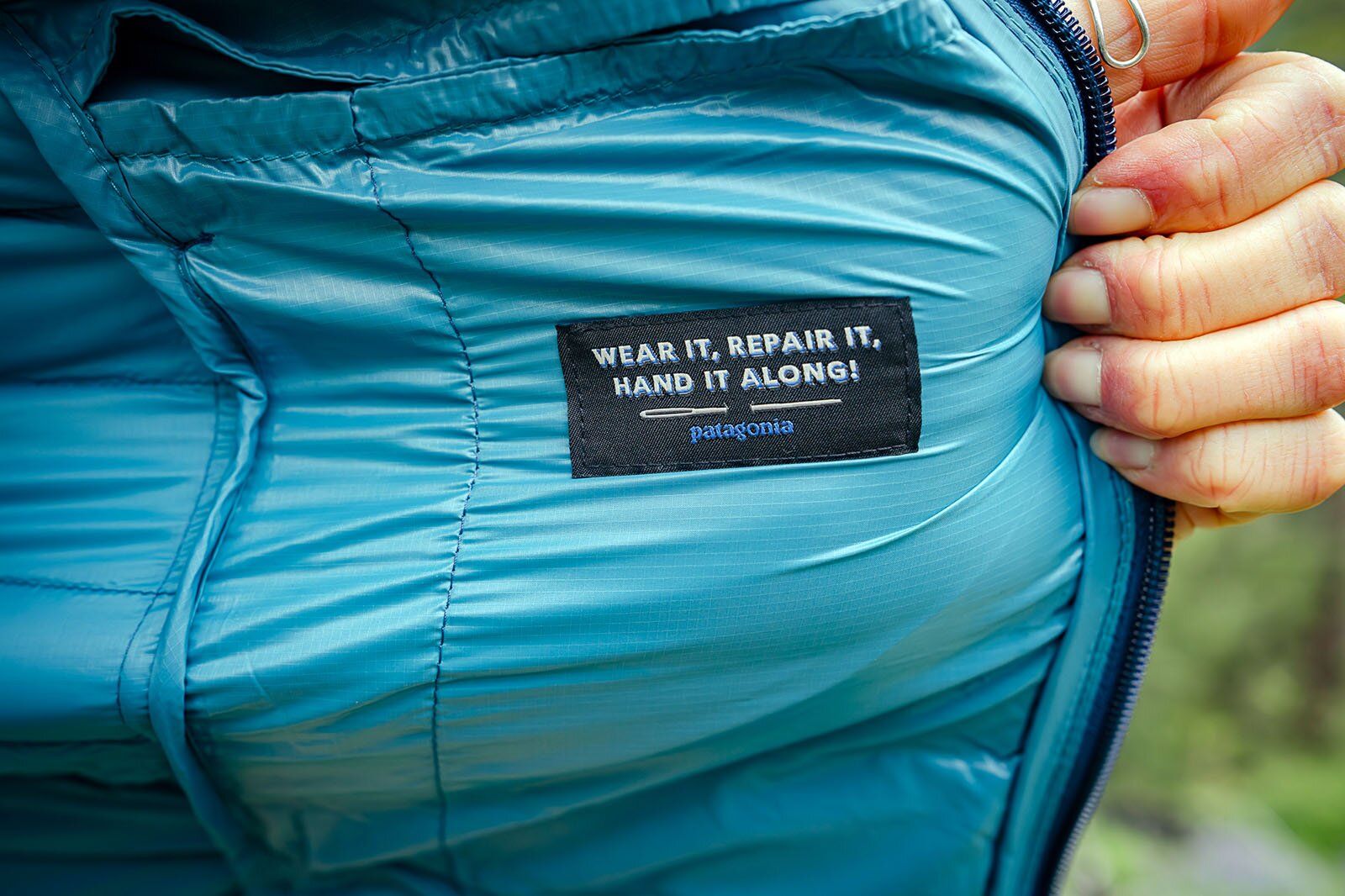Patagonia Label Wear it Repair it Pass it Along