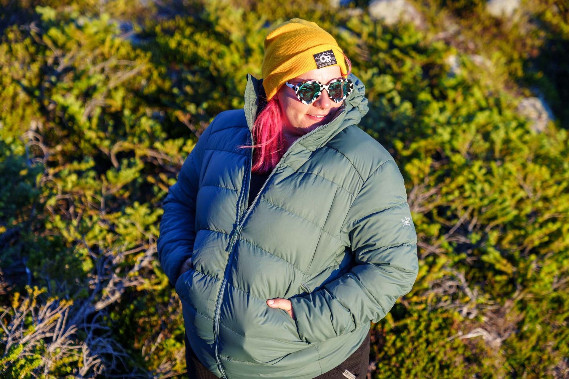 Person with hands in pockets of Arc'teryx Thorium down jacket