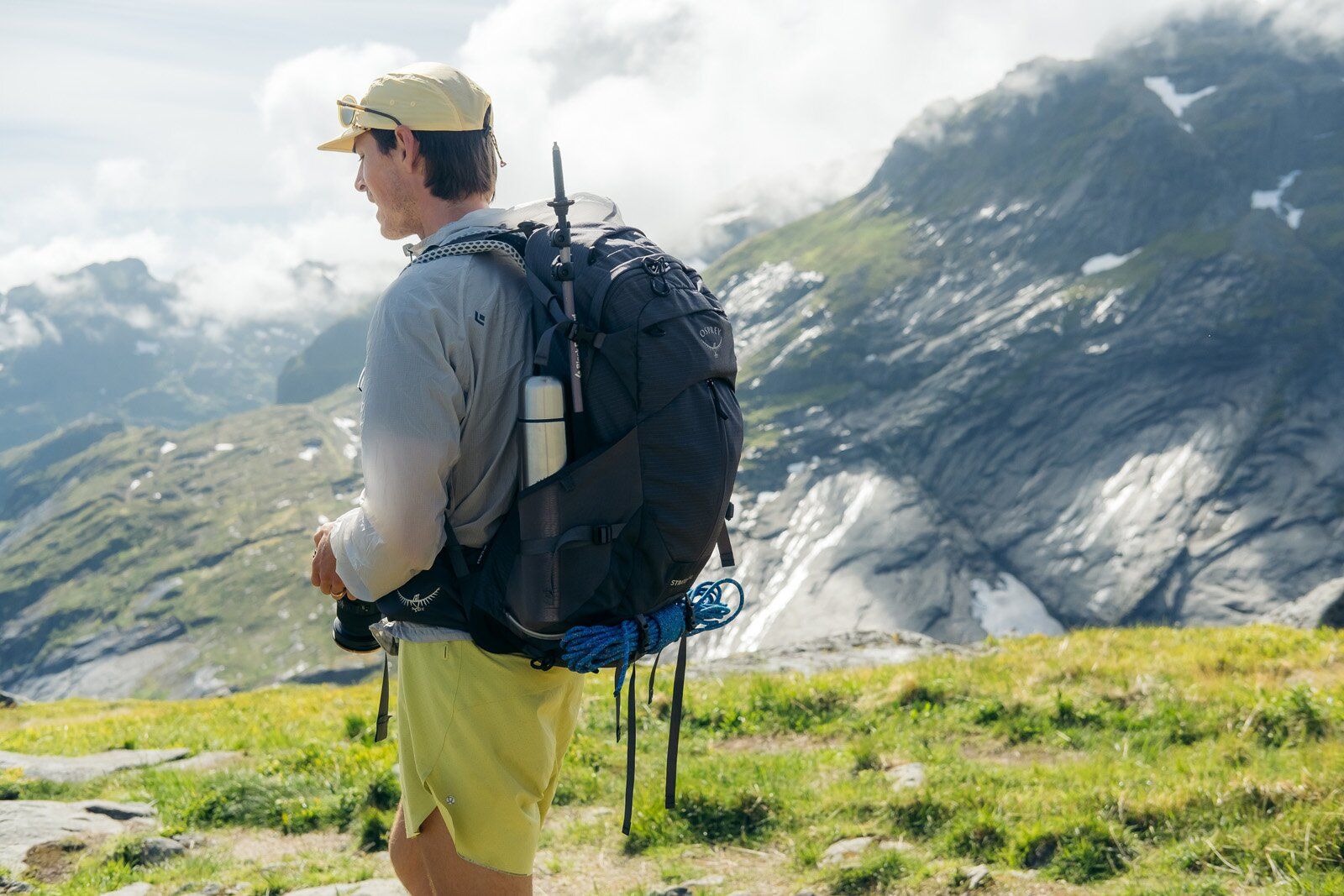 Rear view of hiker wearing Osprey Stratos 34 hiking daypack