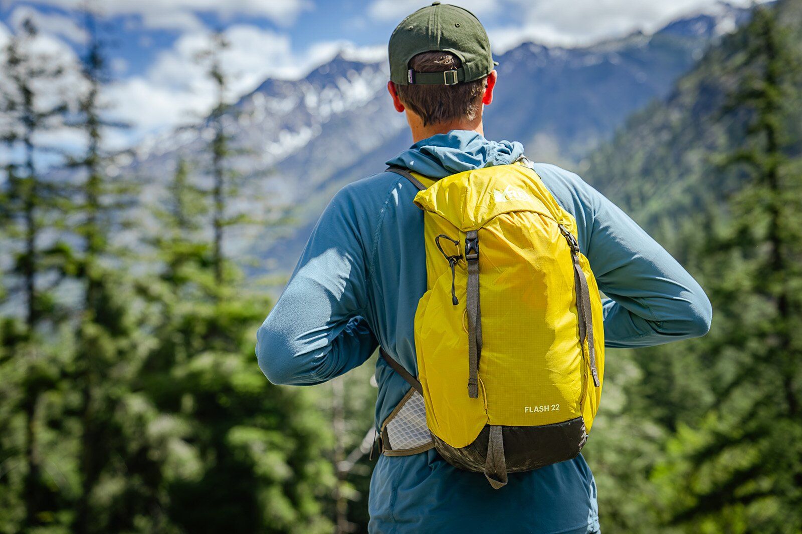 Rear view of hiker wearing the REI Co-op Flash 22 hiking daypack