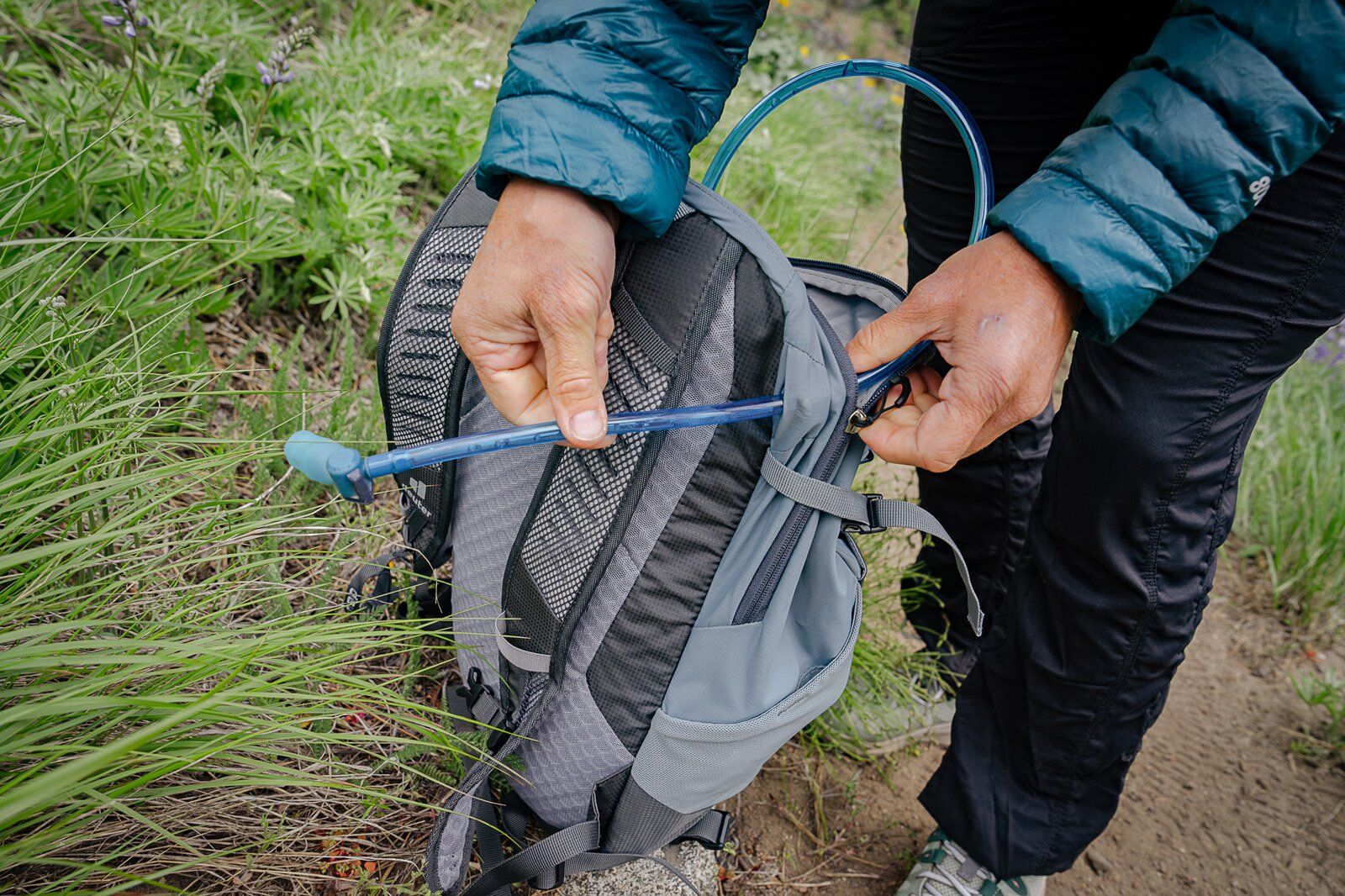 Setting up hydration bladder in Deuter Speed Lite 21 hiking daypack