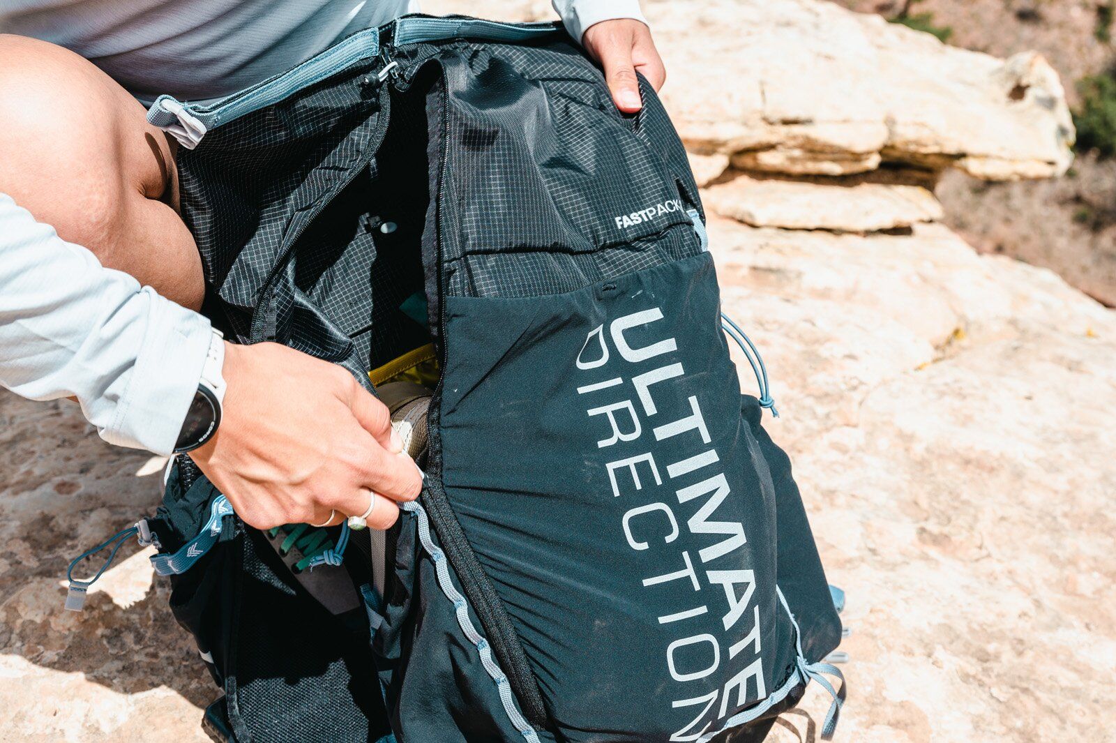 Ultimate Direction Fastpack 20 hiking daypack zip-down main compartment