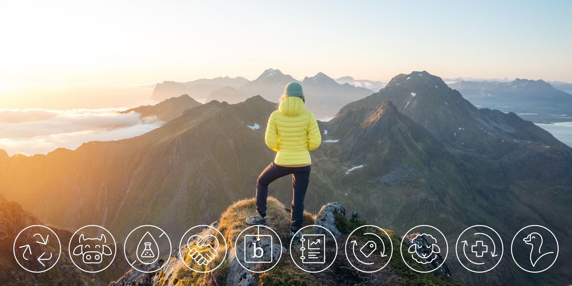 woman looking over Lofoten with sustainability icons spaced
